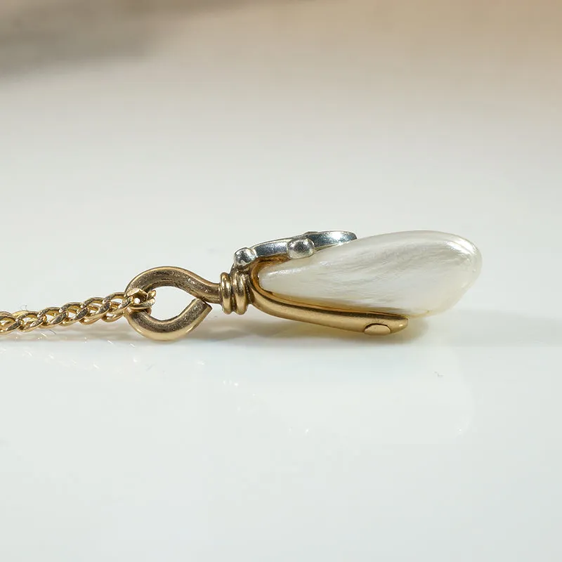 Baroque Pearl Pendant Capped in Gold, Platinum & Diamond