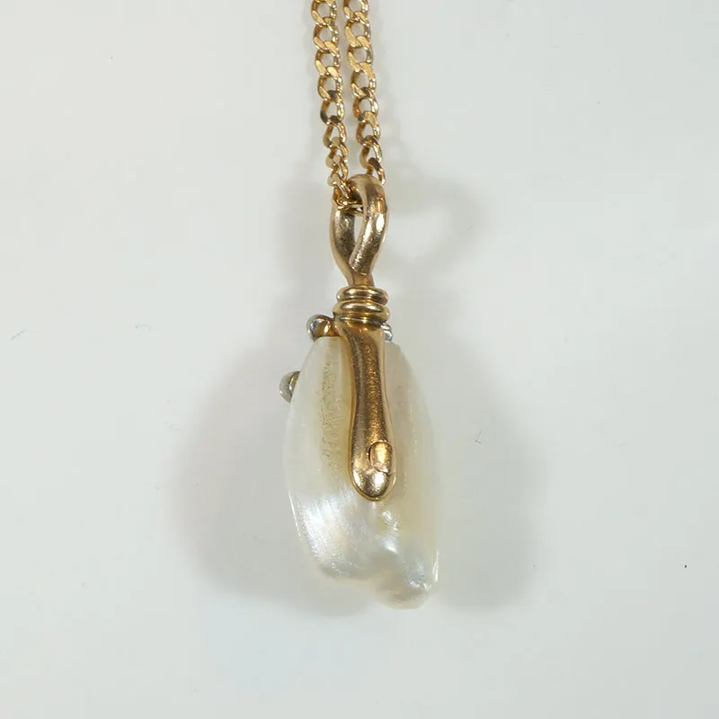 Baroque Pearl Pendant Capped in Gold, Platinum & Diamond