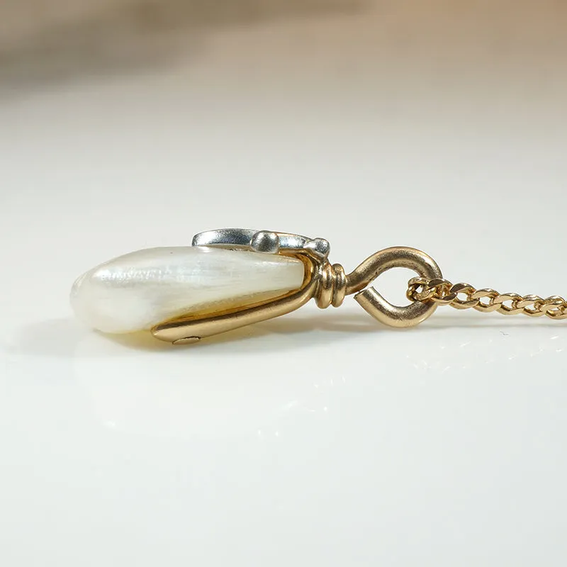 Baroque Pearl Pendant Capped in Gold, Platinum & Diamond