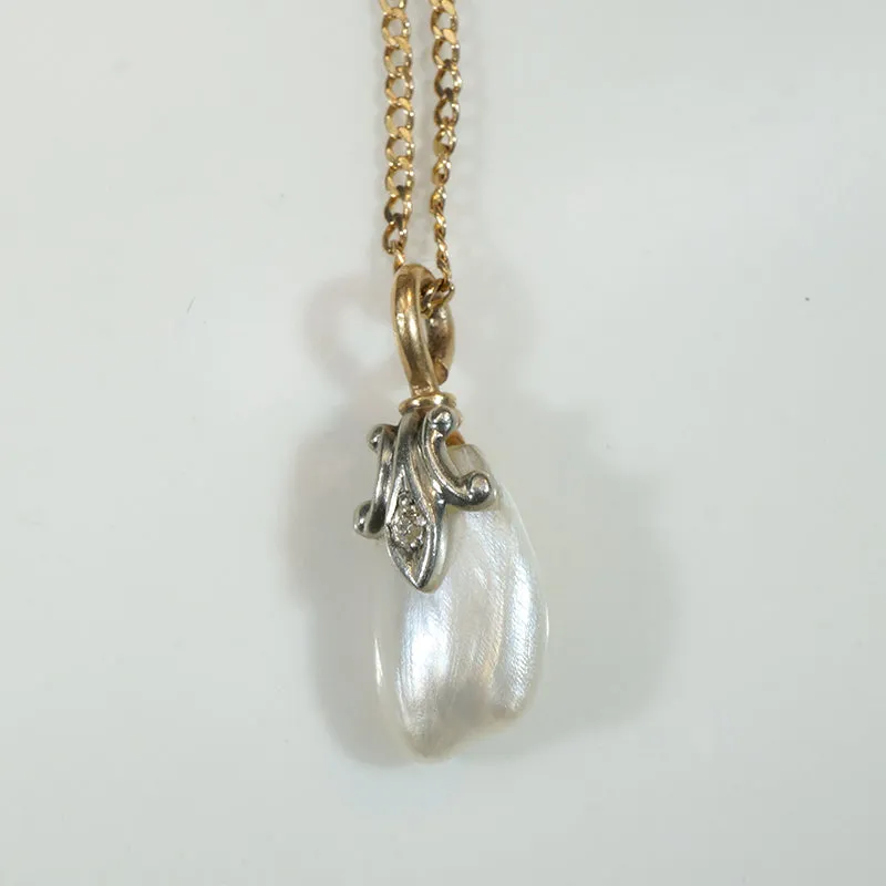 Baroque Pearl Pendant Capped in Gold, Platinum & Diamond