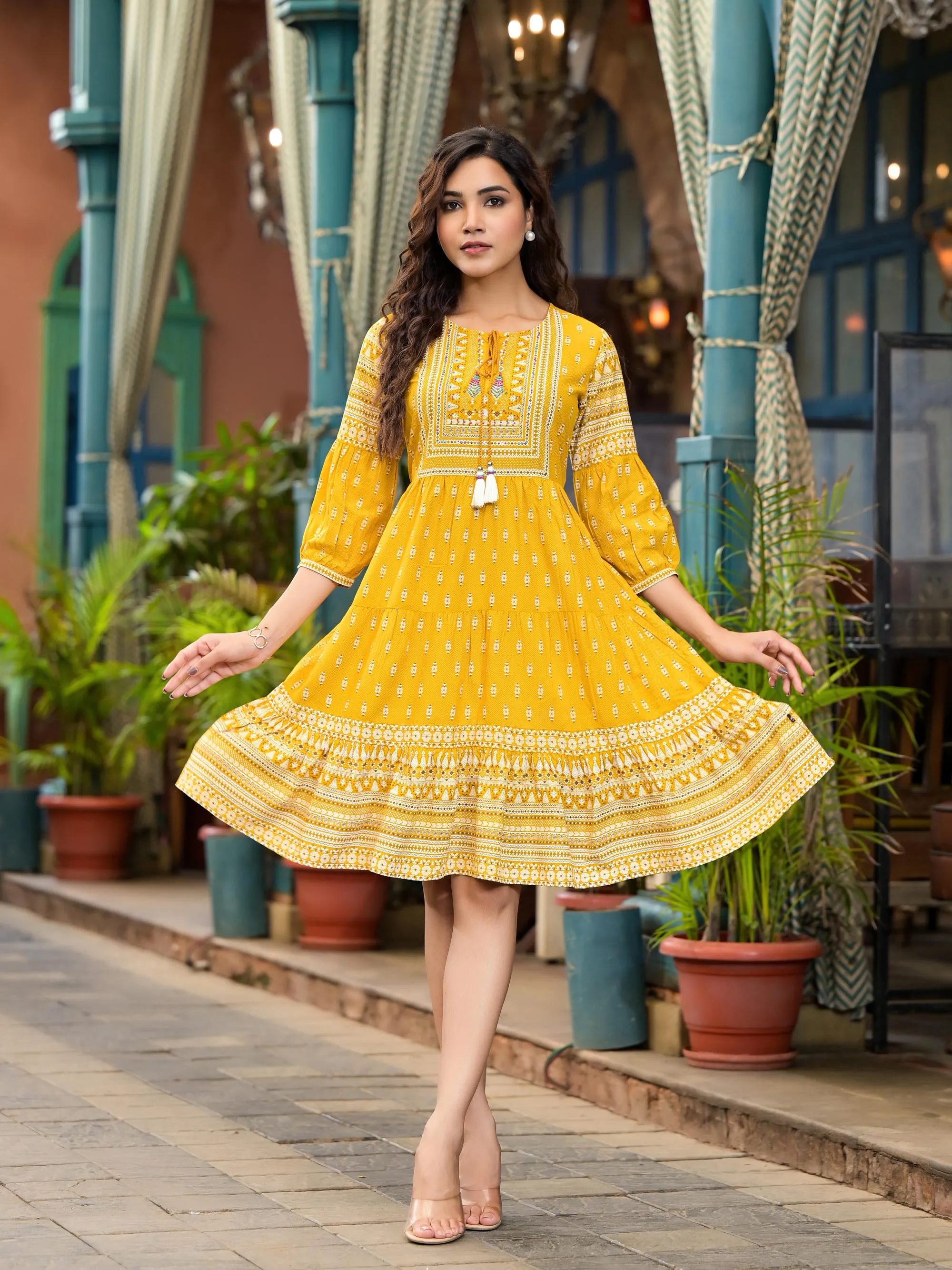 Mustard Ethnic Motif Printed Liva Rayon Dress With Thread Work & Tassels